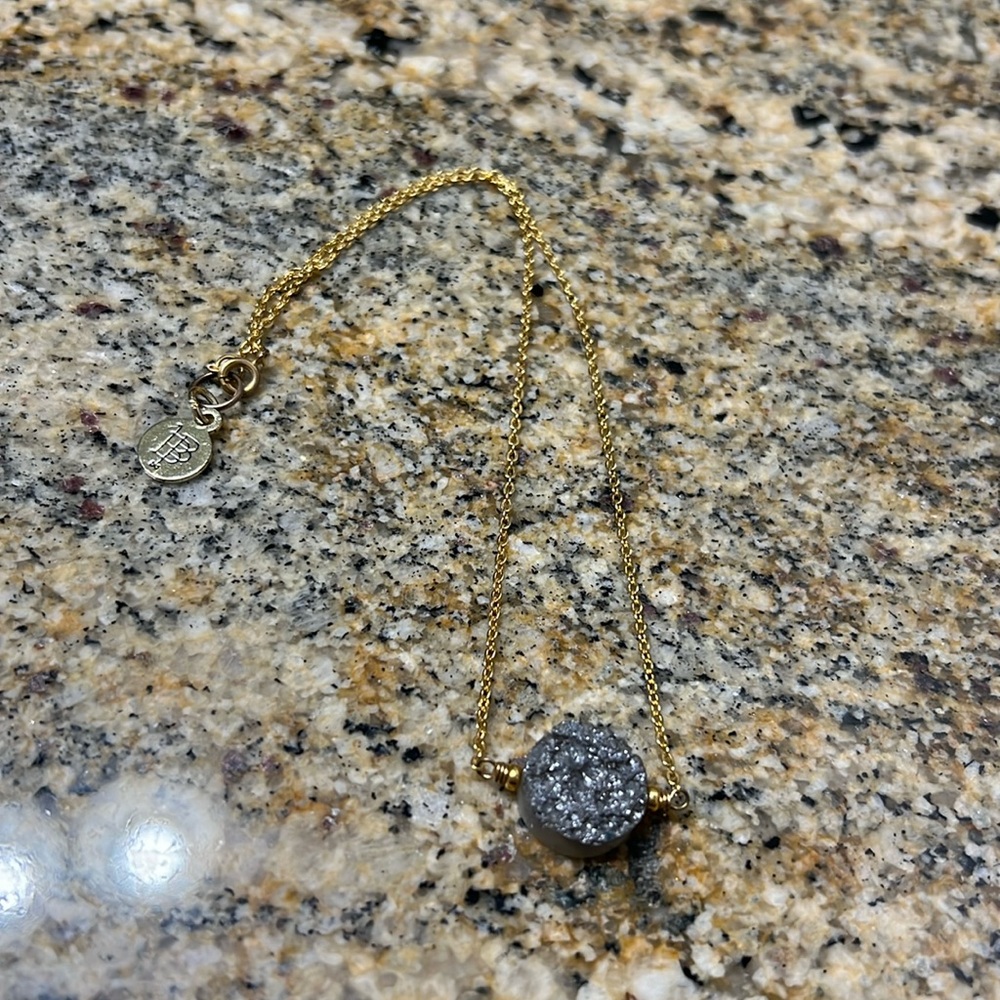 Bourbon and bowties, gold short chain necklace with silver stone